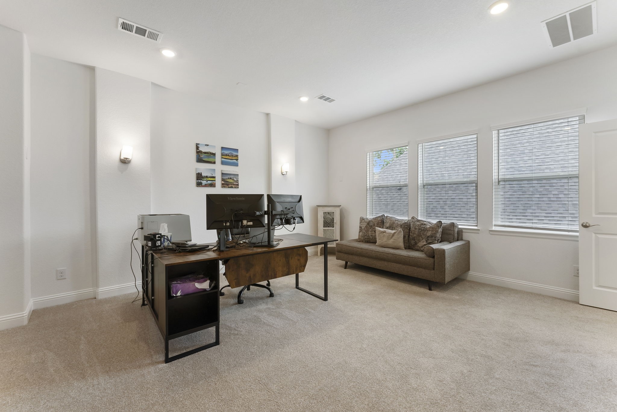 12932 Whitewater Way Conroe, TX 77302 - Photo 23 of 48 There is a spacious second-floor flex space currently used as an office, offering endless possibilities as a media room, game room, playroom, or additional living area for all ages!