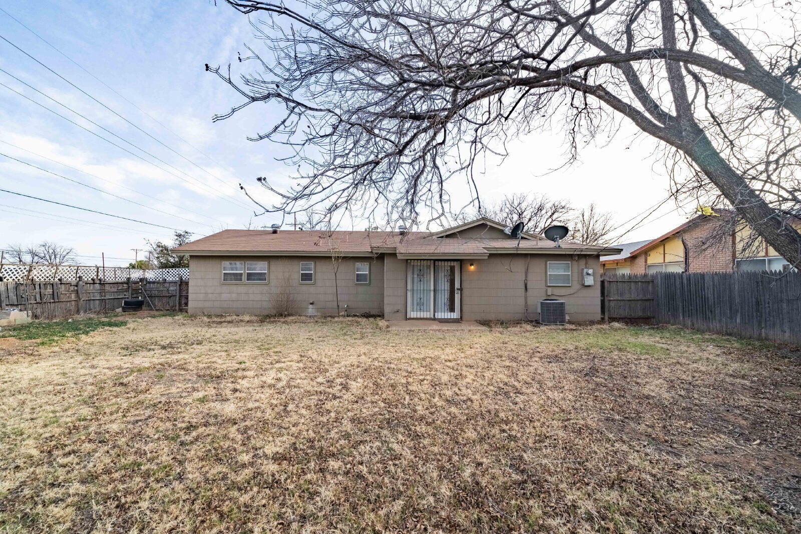 5202 47th Street Lubbock, TX 79414 - Photo 13 of 15 a house view with a outdoor space