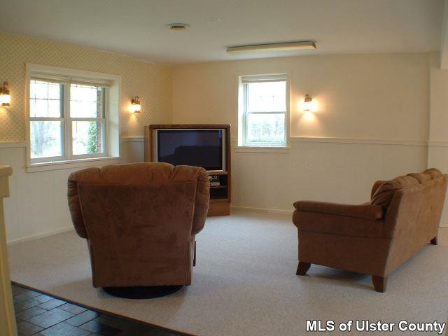 607 Old Rte 32, Unit LANE OFF OLD ROUTE 32 New Paltz, NY 12561 - Photo 6 of 6 a living room with furniture and a window