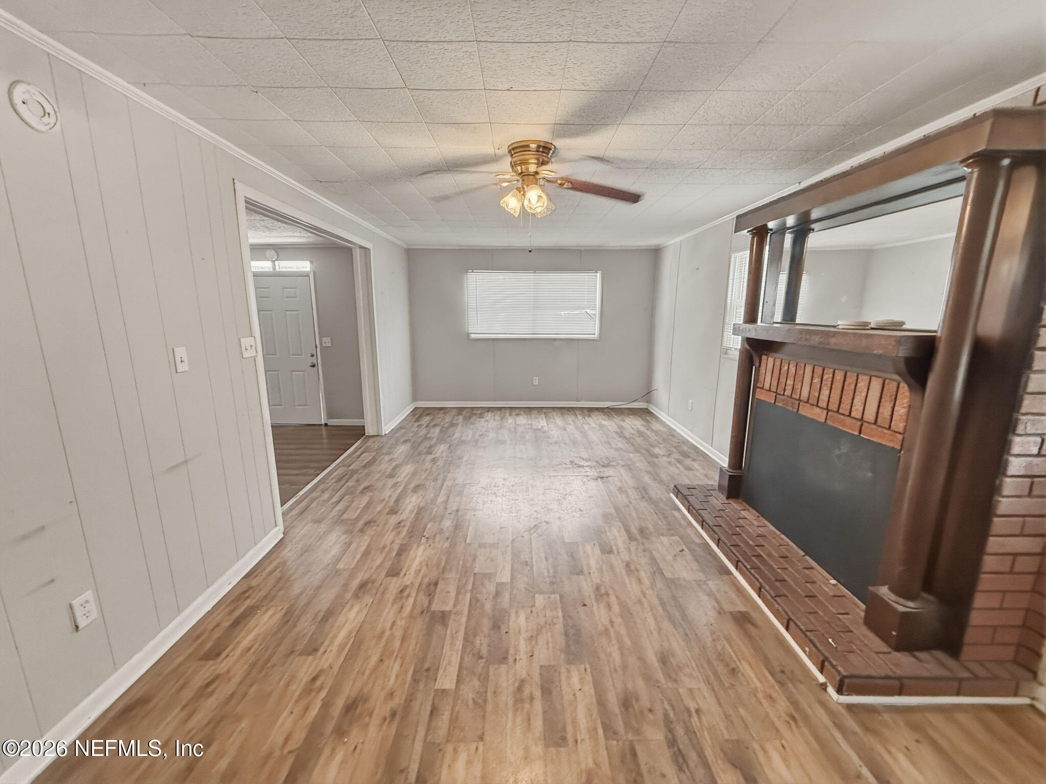 326 Cahoon Road South Jacksonville, FL 32220 - Photo 11 of 34 a view of empty room with wooden floor