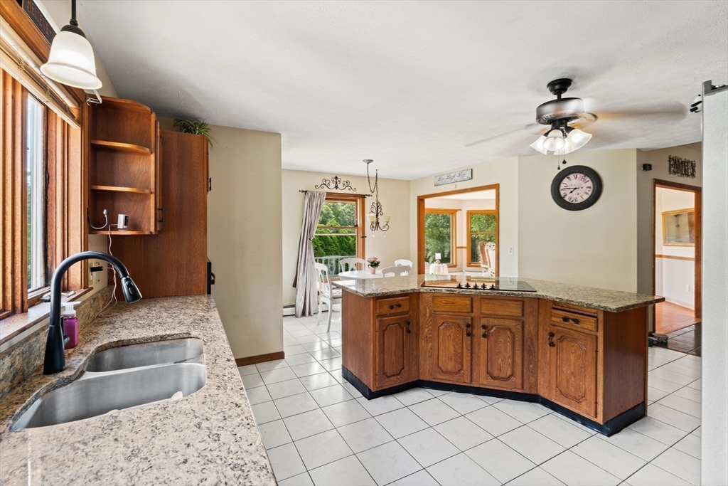 103 Renshaw Road Weare, NH 03281 - Photo 13 of 42 a large bathroom with a granite countertop sink and a mirror