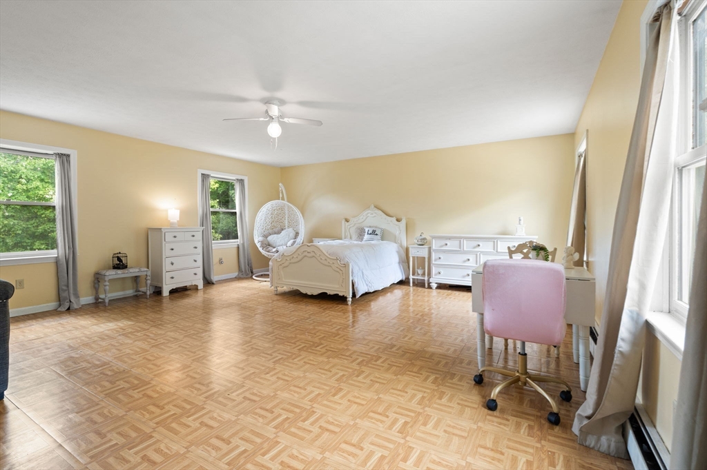 103 Renshaw Road Weare, NH 03281 - Photo 30 of 42 a living room with furniture and a window