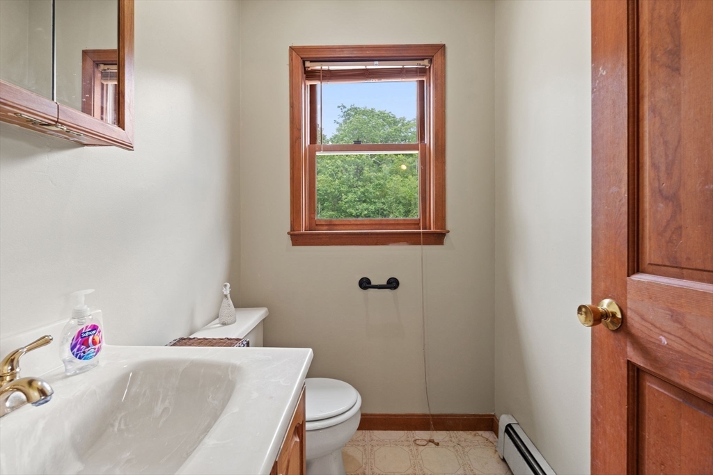 103 Renshaw Road Weare, NH 03281 - Photo 33 of 42 a bathroom with a sink and a toilet