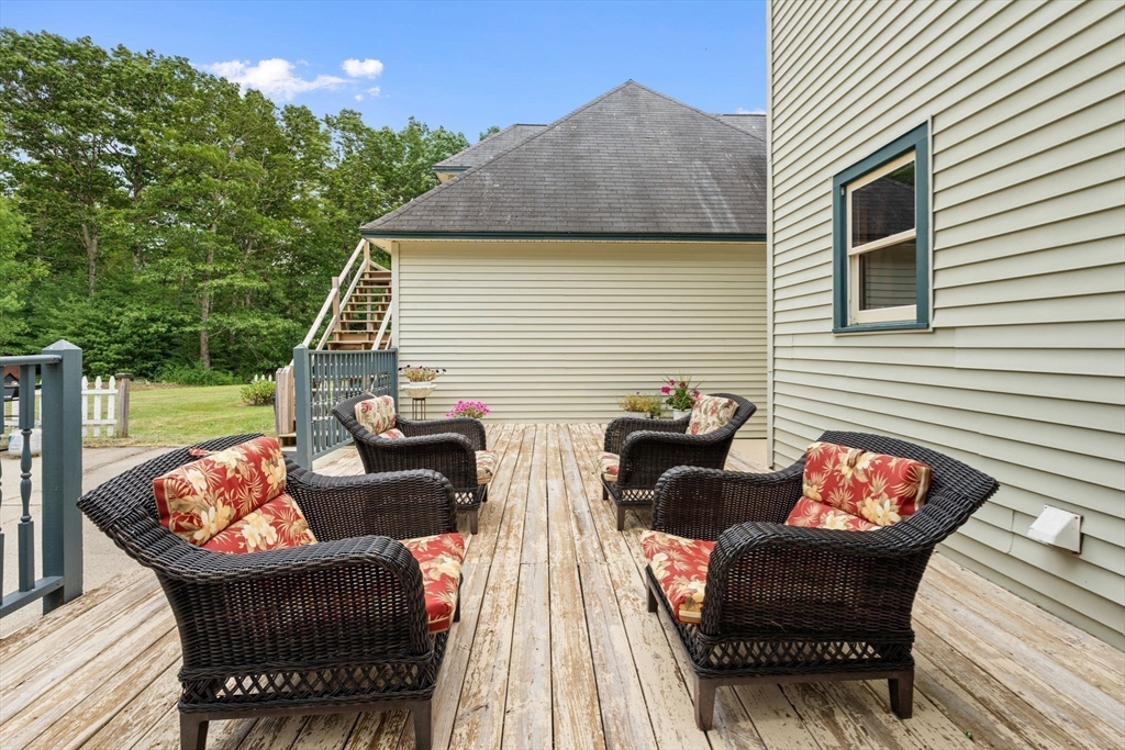 103 Renshaw Road Weare, NH 03281 - Photo 36 of 42 a view of a roof deck with couches