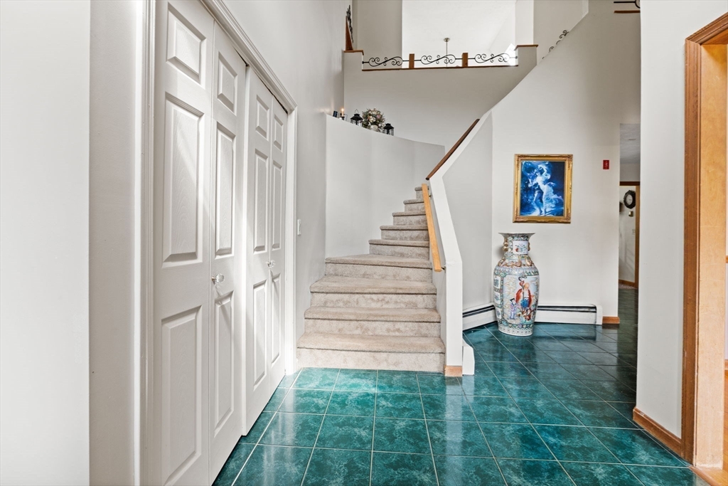 103 Renshaw Road Weare, NH 03281 - Photo 5 of 42 a view of entryway with white walls and stairs