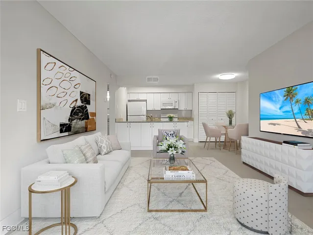 a living room with furniture and view