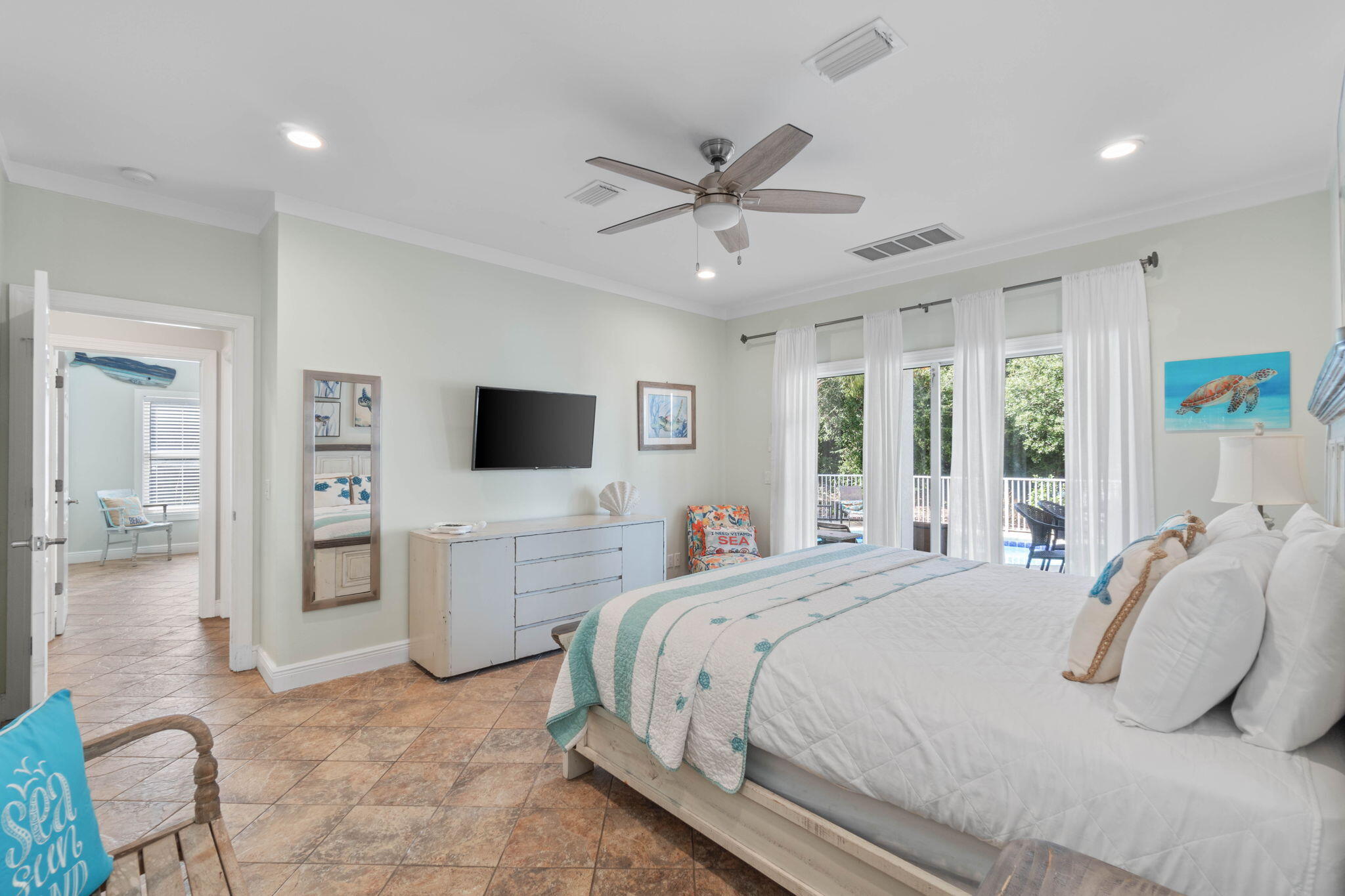 226 Sandtrap Road Miramar Beach, FL 32550 - Photo 11 of 63 a bedroom with a large bed and a flat screen tv