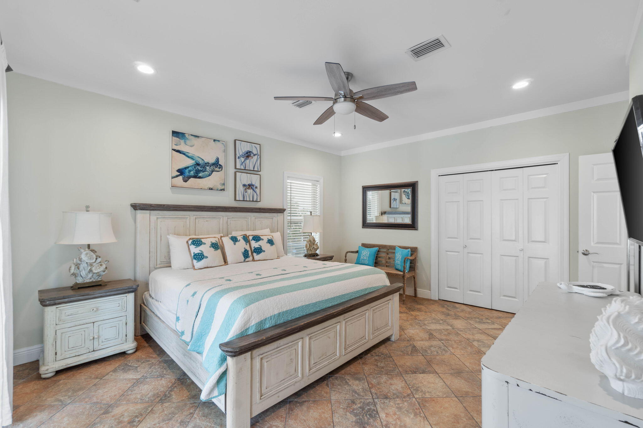 226 Sandtrap Road Miramar Beach, FL 32550 - Photo 12 of 63 a bedroom with a bed and a chandelier