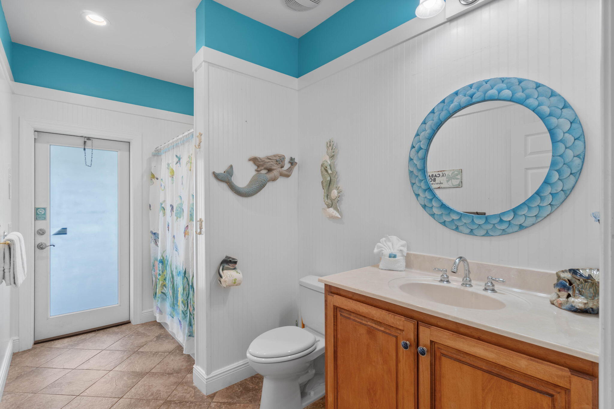 226 Sandtrap Road Miramar Beach, FL 32550 - Photo 13 of 63 a bathroom with a granite countertop sink a mirror and a toilet