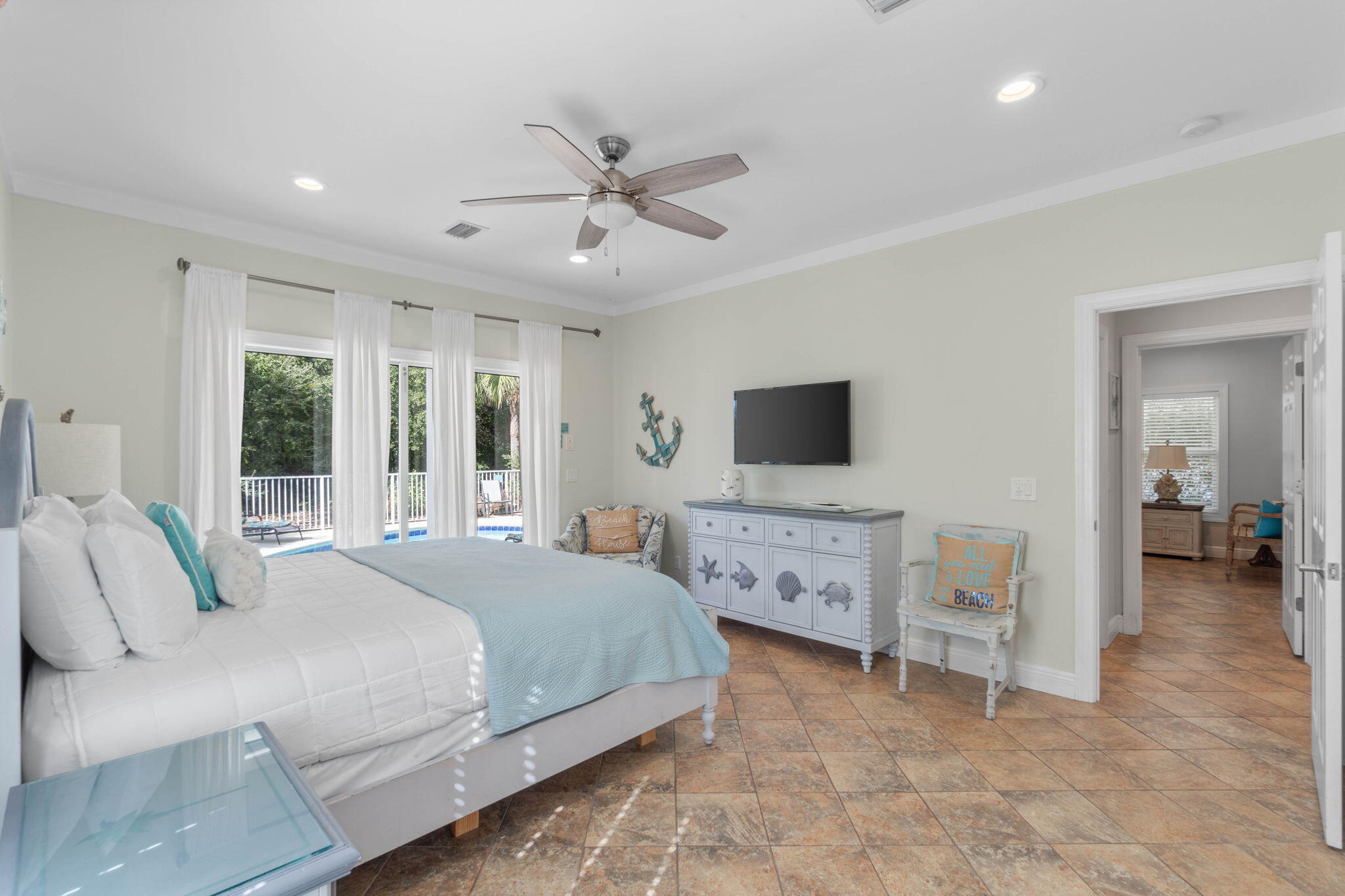 226 Sandtrap Road Miramar Beach, FL 32550 - Photo 15 of 63 a bedroom with a bed and a flat screen tv