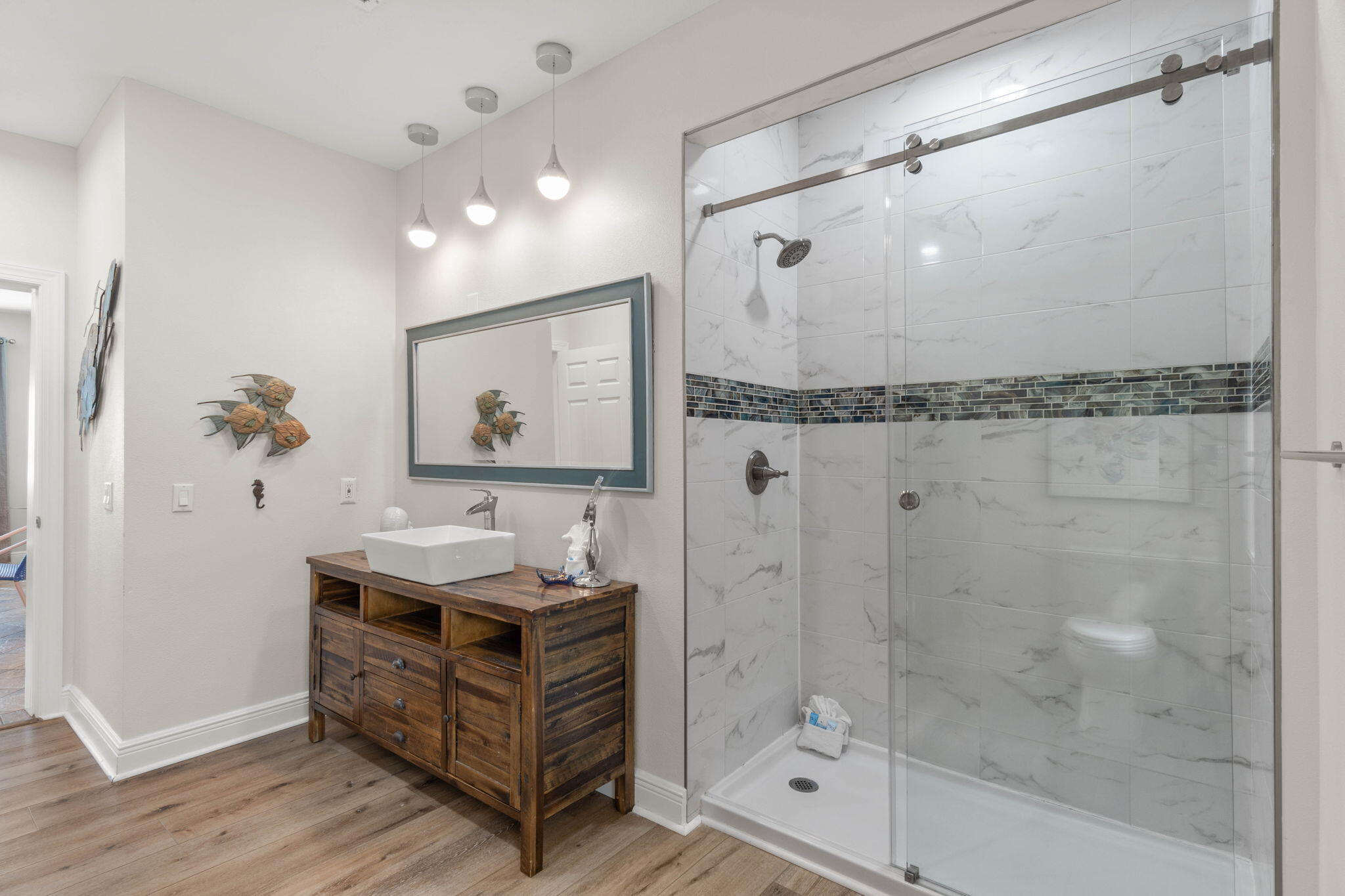 226 Sandtrap Road Miramar Beach, FL 32550 - Photo 18 of 63 a bathroom with a tub shower vanity and sink