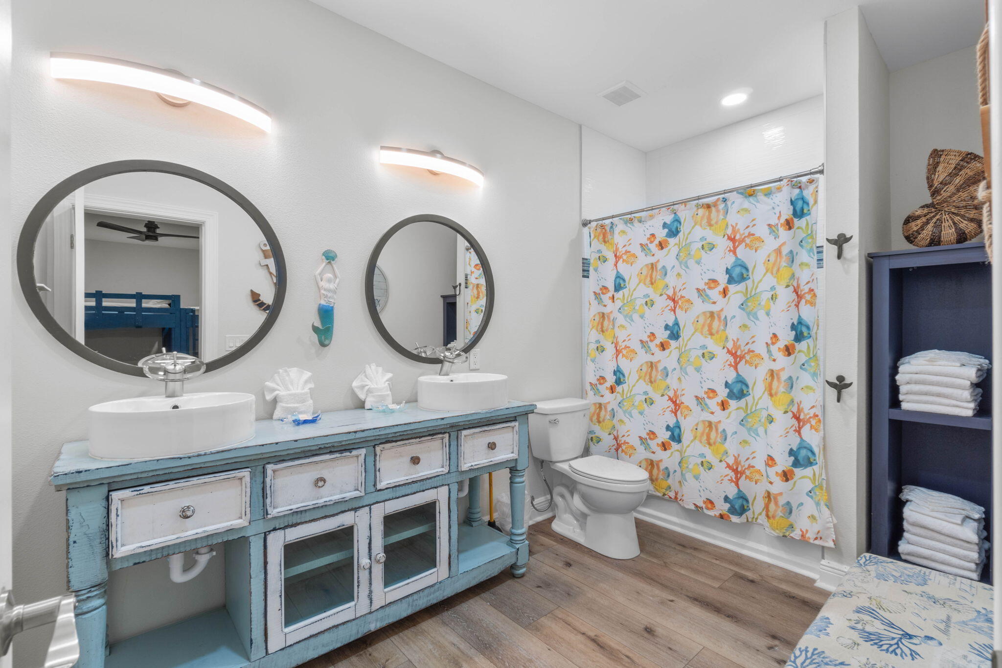 226 Sandtrap Road Miramar Beach, FL 32550 - Photo 25 of 63 a bathroom with a double vanity sink mirror and toilet