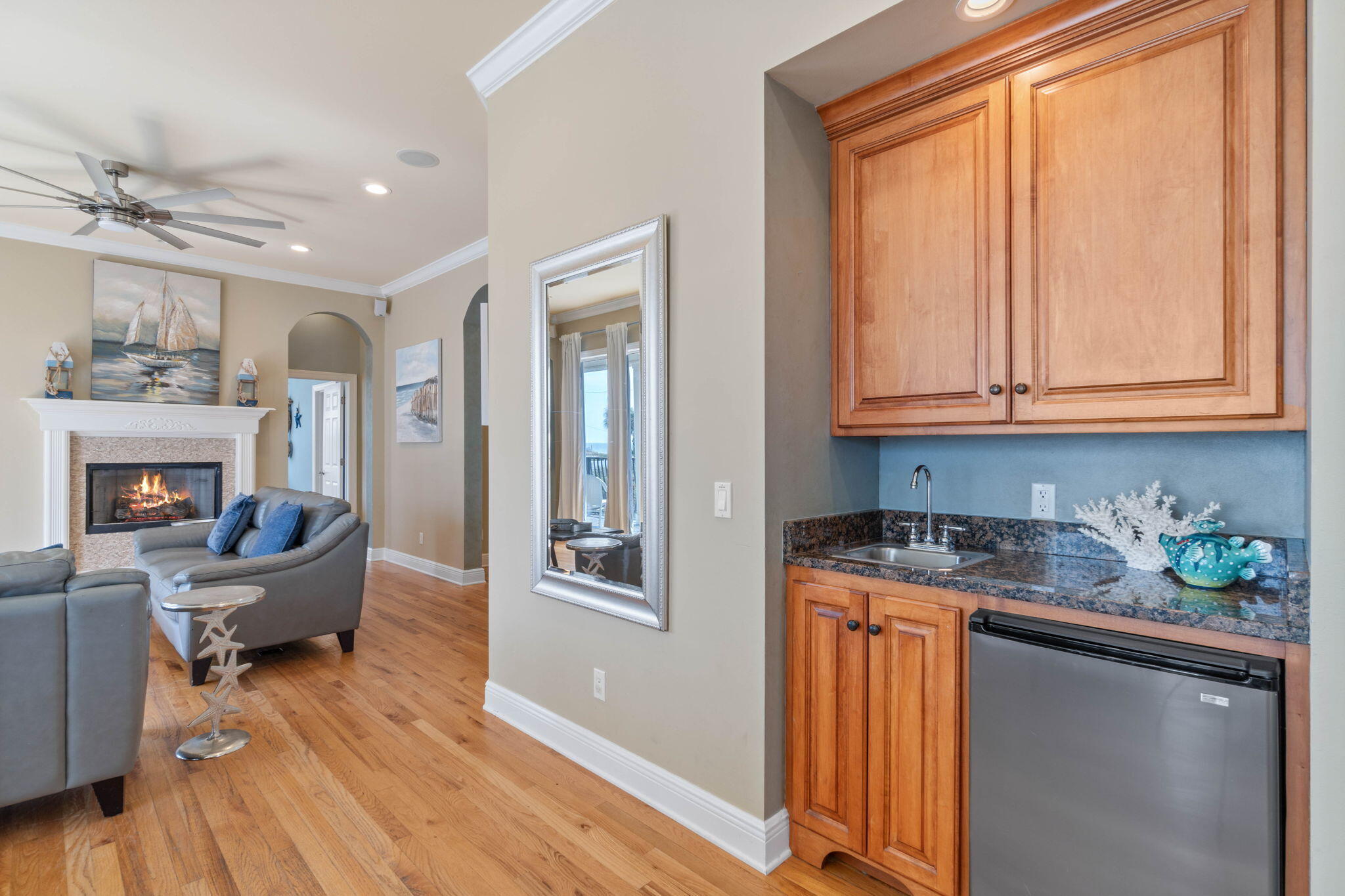 226 Sandtrap Road Miramar Beach, FL 32550 - Photo 35 of 63 a kitchen with stainless steel appliances granite countertop a stove a sink and a refrigerator with wooden floors