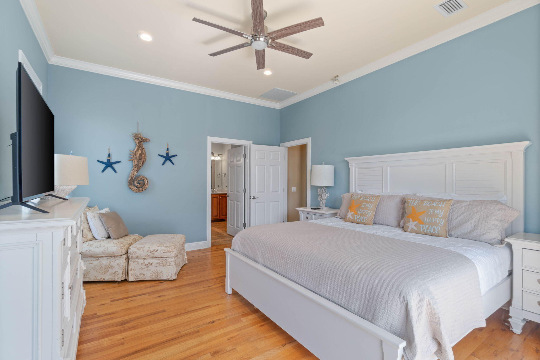 226 Sandtrap Road Miramar Beach, FL 32550 - Photo 39 of 63 a spacious bedroom with a bed and a flat screen tv