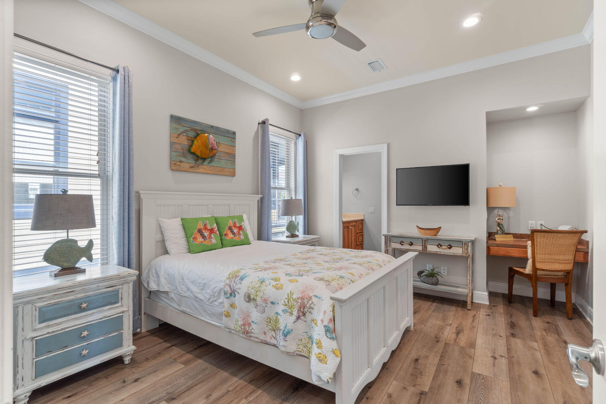 226 Sandtrap Road Miramar Beach, FL 32550 - Photo 49 of 63 a bedroom with a bed and a flat screen tv