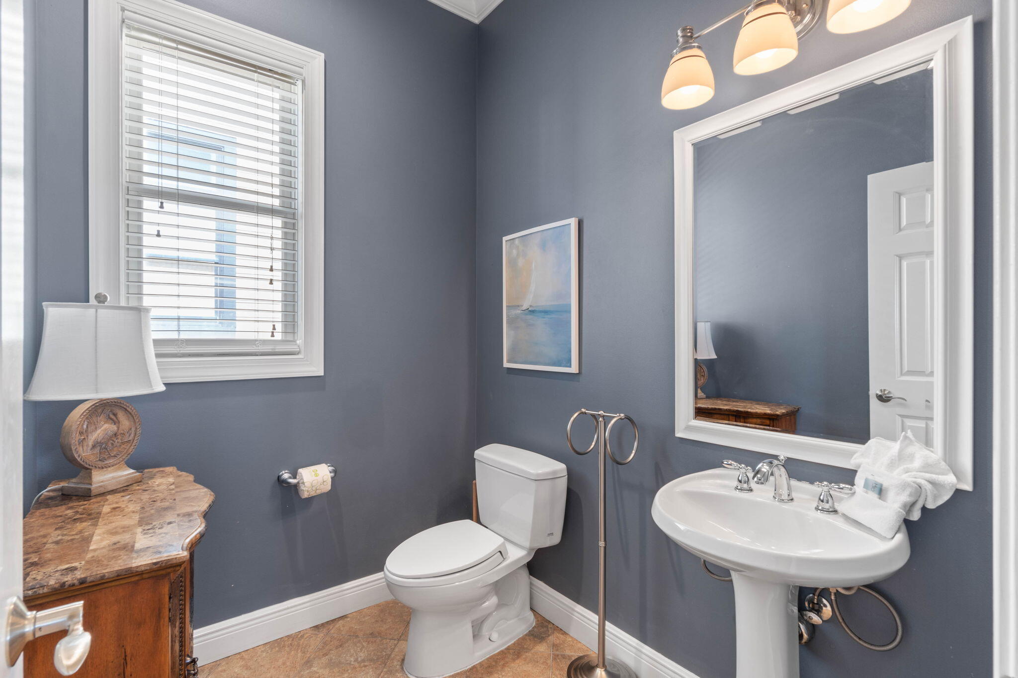 226 Sandtrap Road Miramar Beach, FL 32550 - Photo 50 of 63 a bathroom with a sink toilet and mirror