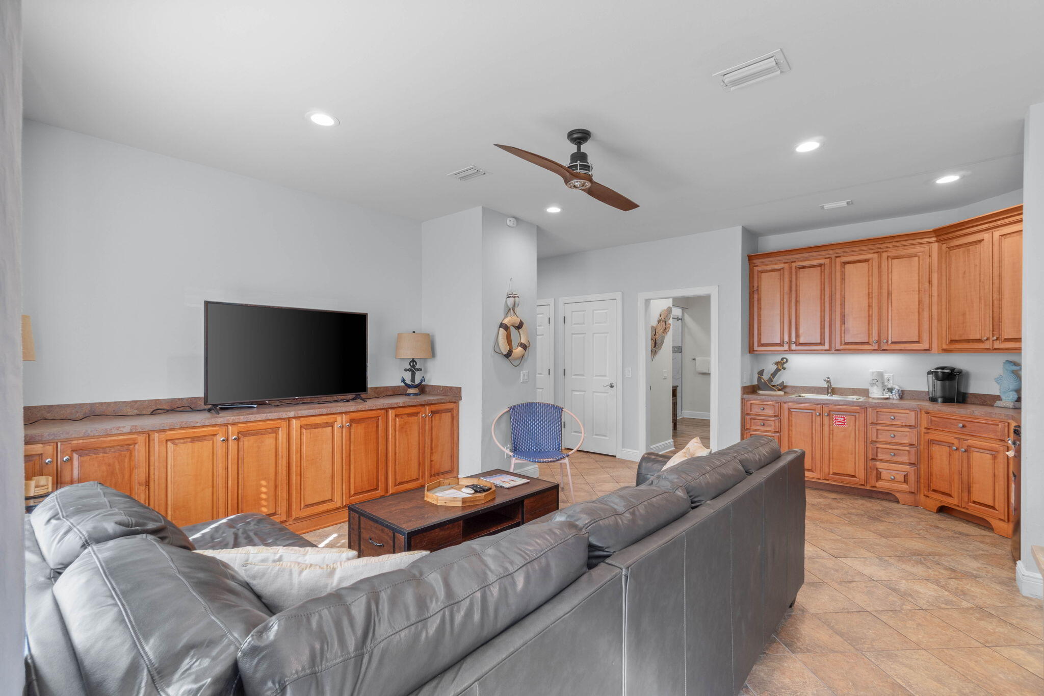 226 Sandtrap Road Miramar Beach, FL 32550 - Photo 5 of 63 a living room with furniture and a flat screen tv