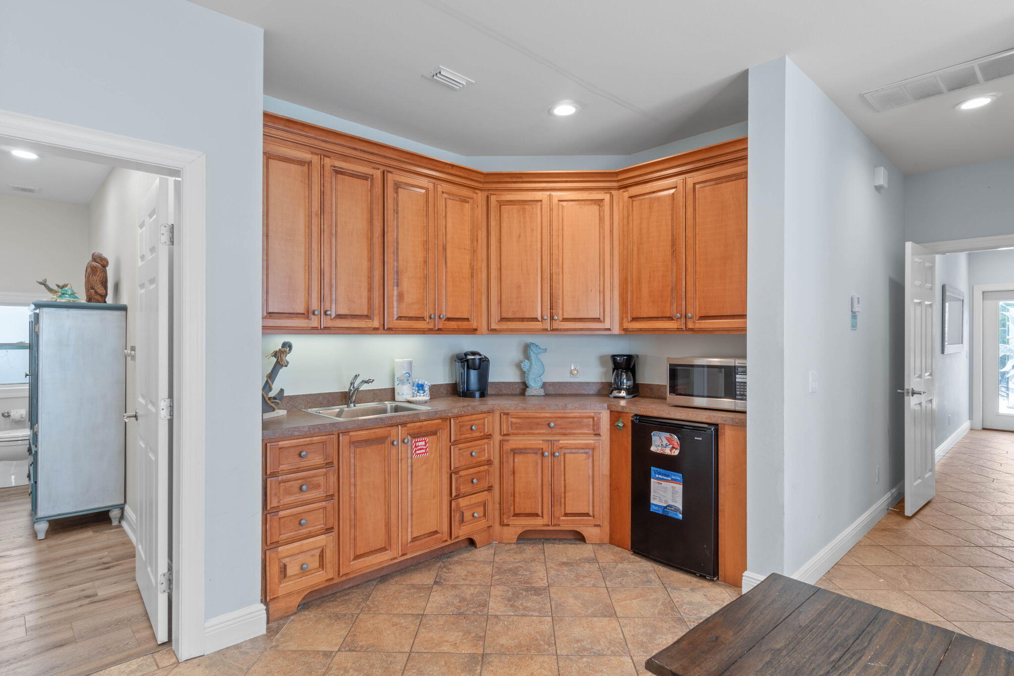 226 Sandtrap Road Miramar Beach, FL 32550 - Photo 8 of 63 a kitchen with stainless steel appliances granite countertop a refrigerator and a stove top oven