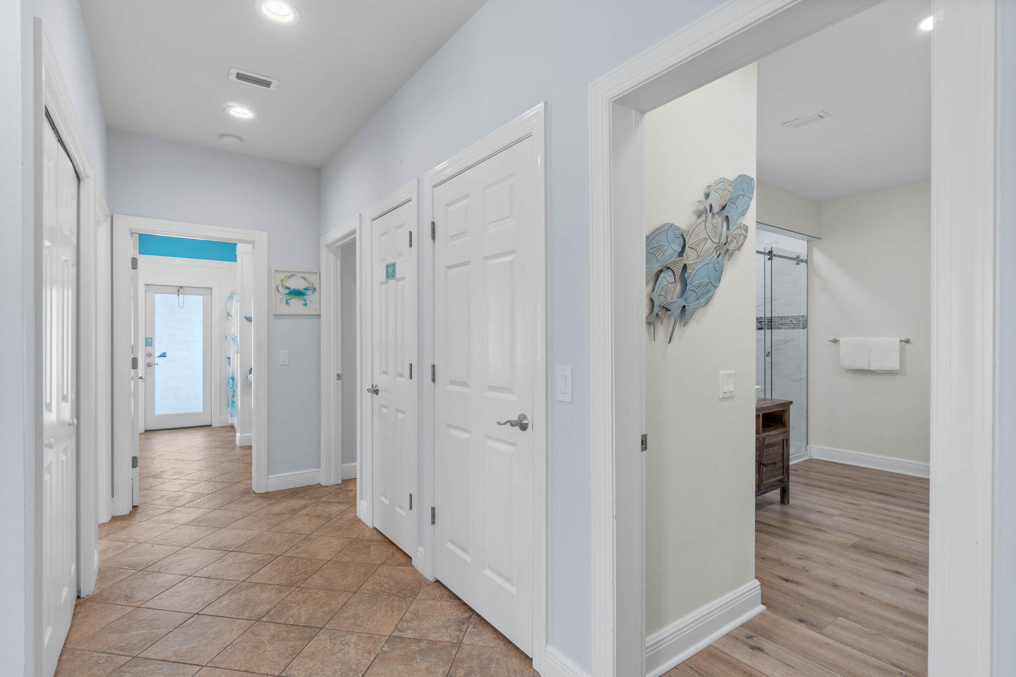 226 Sandtrap Road Miramar Beach, FL 32550 - Photo 9 of 63 a view of a hallway with wooden floor