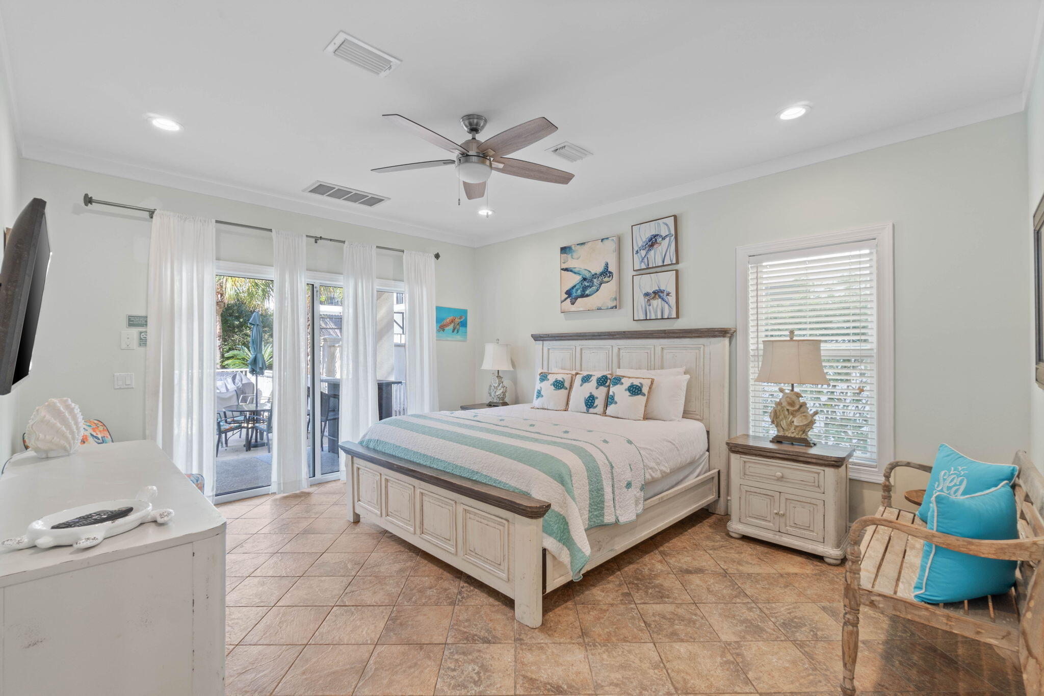 226 Sandtrap Road Miramar Beach, FL 32550 - Photo 10 of 63 a bedroom with a bed and a chandelier
