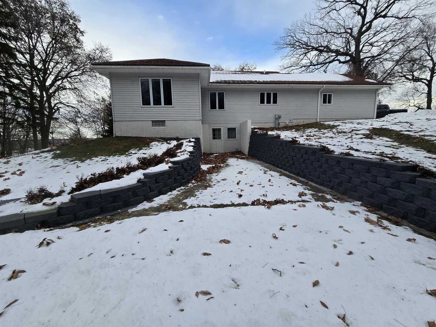 12719 Garden Plain Road Morrison, IL 61270 - Photo 11 of 85 a view of a house with a yard covered with snow
