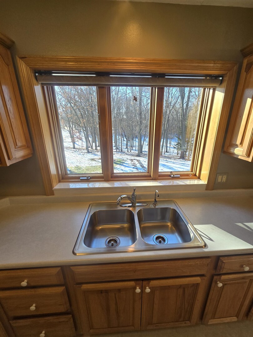 12719 Garden Plain Road Morrison, IL 61270 - Photo 22 of 85 a sink sitting next to a window