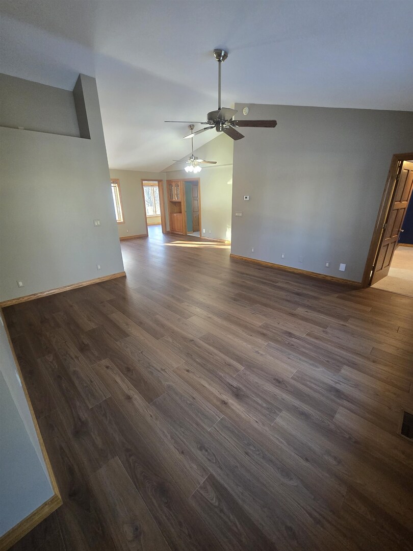 12719 Garden Plain Road Morrison, IL 61270 - Photo 40 of 85 wooden floor in an empty room with a window