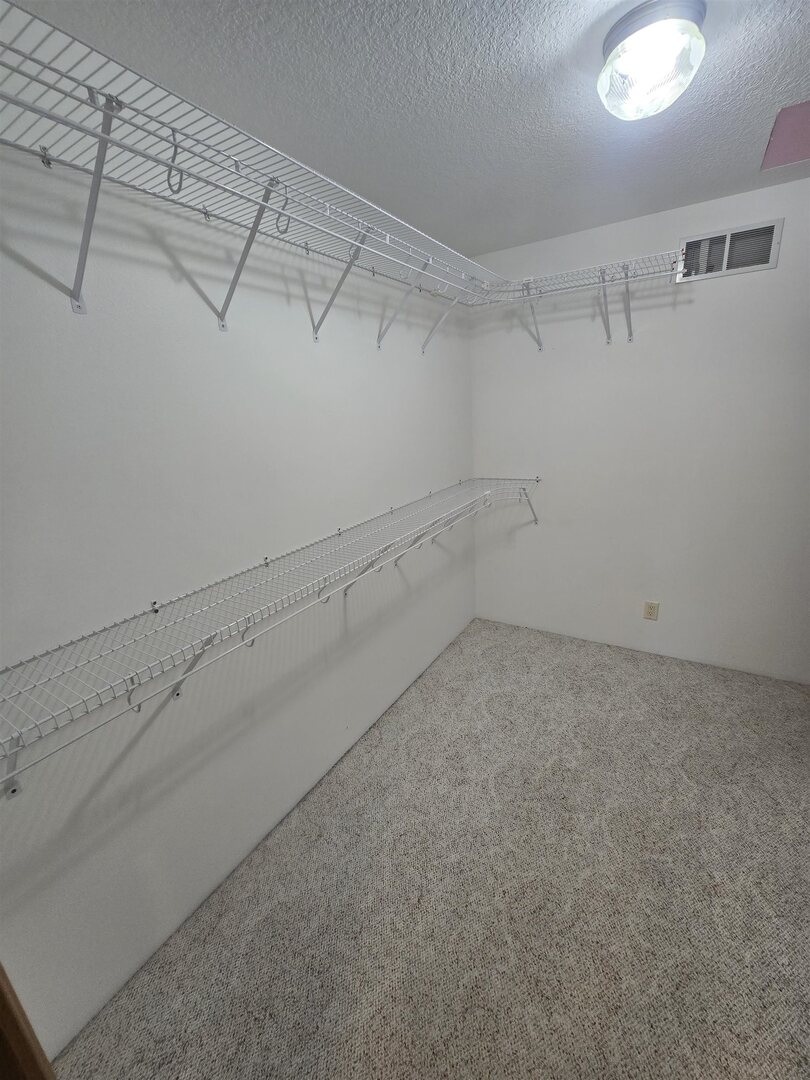 12719 Garden Plain Road Morrison, IL 61270 - Photo 48 of 85 a view of a room with racks on the wall