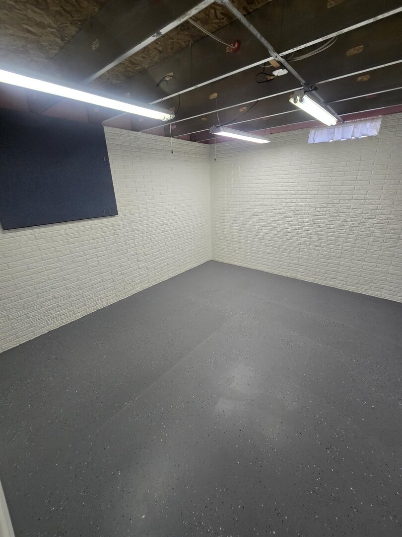 12719 Garden Plain Road Morrison, IL 61270 - Photo 57 of 85 a view of a room with racks on the wall