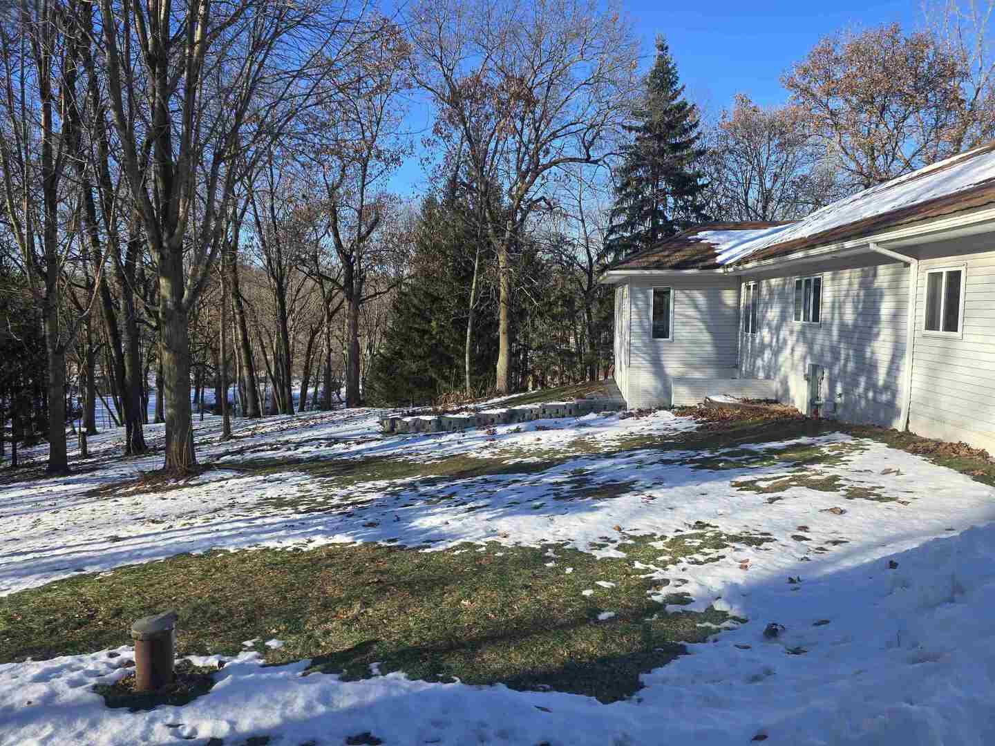 12719 Garden Plain Road Morrison, IL 61270 - Photo 8 of 85 a view of a backyard with large trees