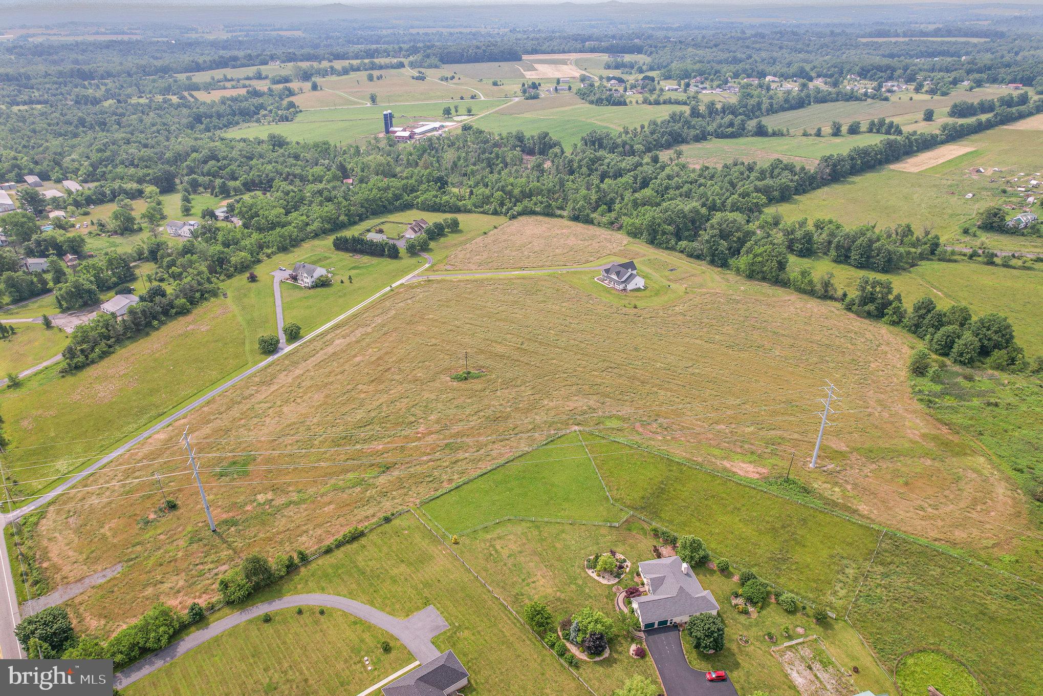 2170 Chambersburg Road Gettysburg, PA 17325 - Photo 12 of 17 an aerial view of a house with a yard and lake view