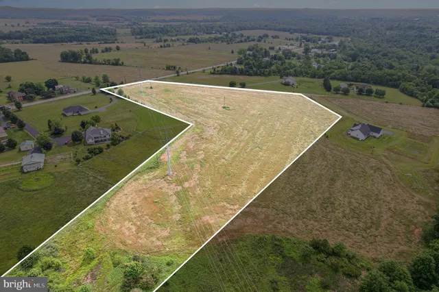 a view of a pool with a yard