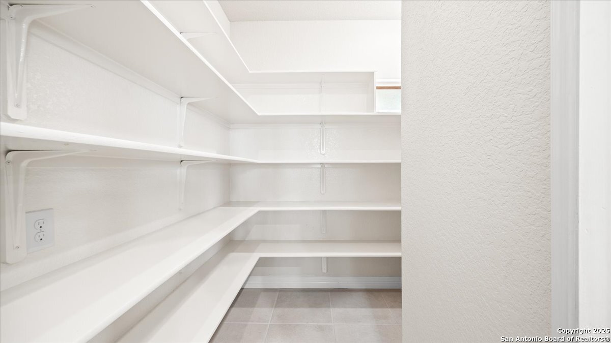 8018 Canham Ranch Garden Ridge, TX 78266 - Photo 17 of 51 a view of a hallway