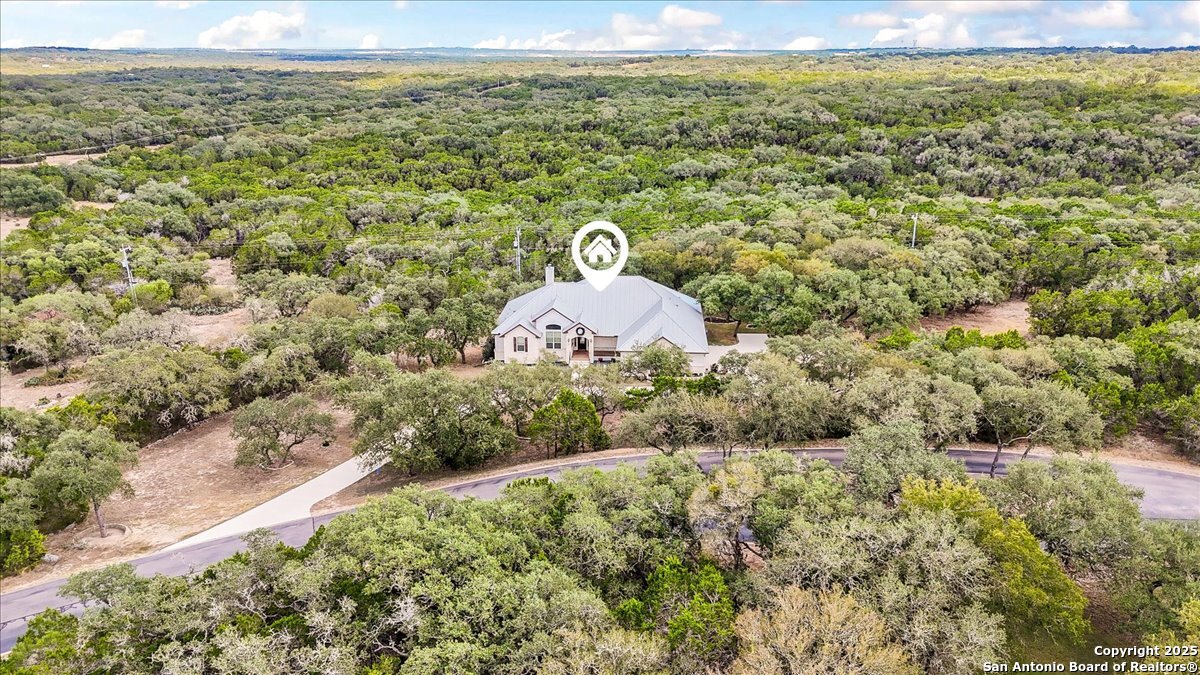 8018 Canham Ranch Garden Ridge, TX 78266 - Photo 45 of 51 a view of a field with an ocean view