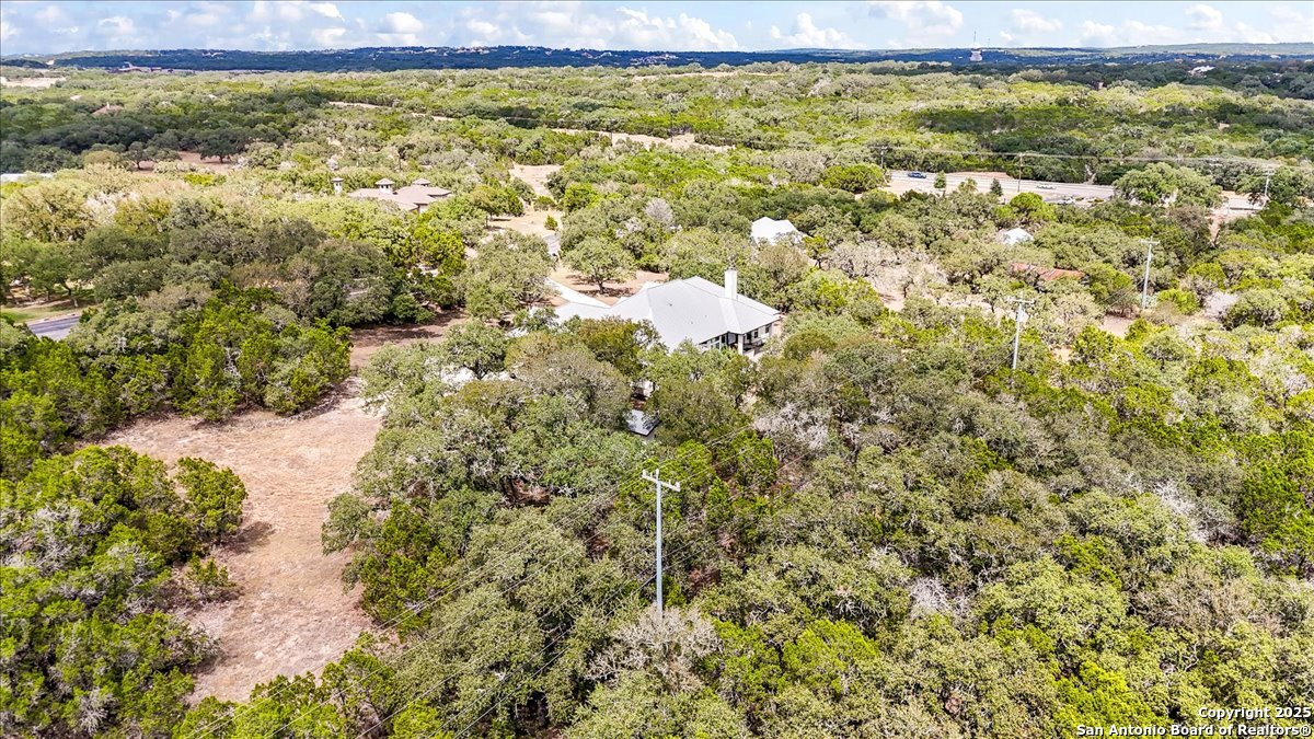 8018 Canham Ranch Garden Ridge, TX 78266 - Photo 50 of 51 a view of a yard with an outdoor space