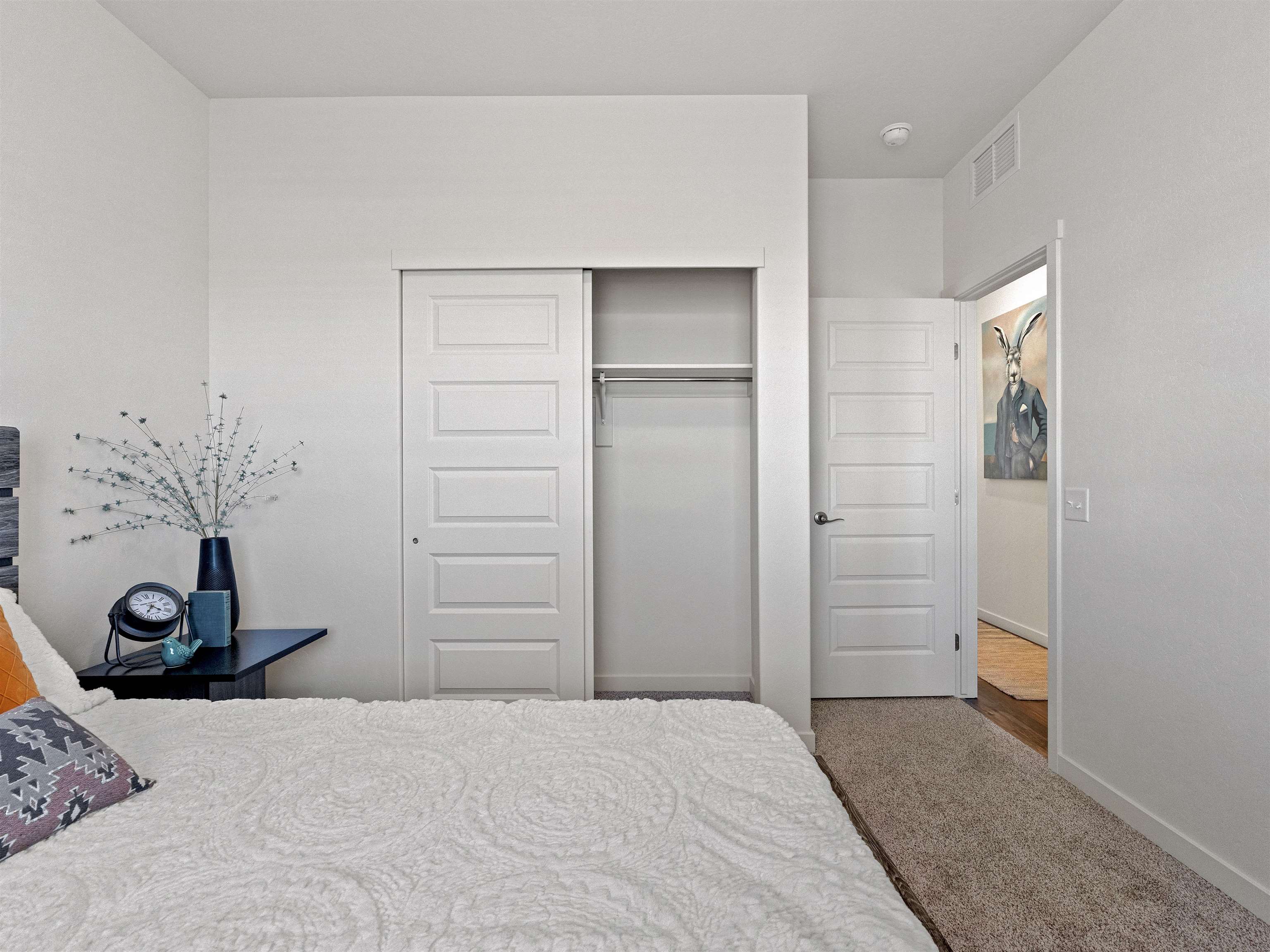 2147 Moon River Road Grand Junction, CO 81505 - Photo 21 of 34 a bedroom with a bed and cabinets