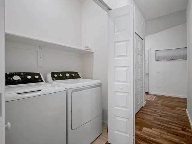 a utility room with dryer and washer