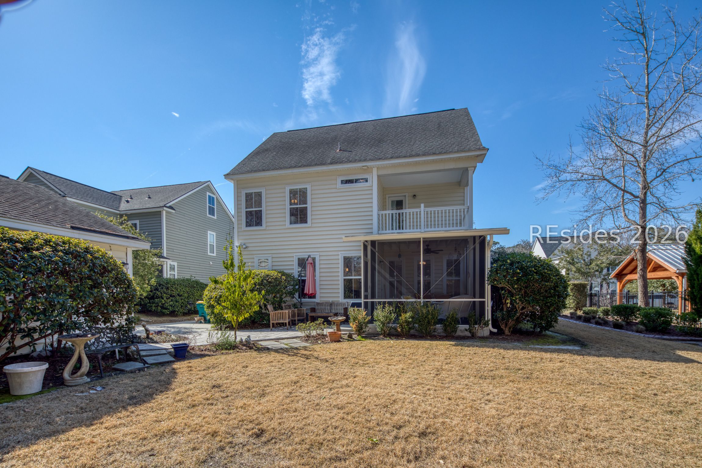 9 Ashley Crossing Drive Bluffton, SC 29910 - Photo 3 of 31 Rear yard and extended screened porch