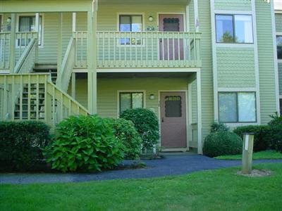 Undisclosed Address Brewster, MA 02631 - Photo 1 of 1 a front view of a house with a garden