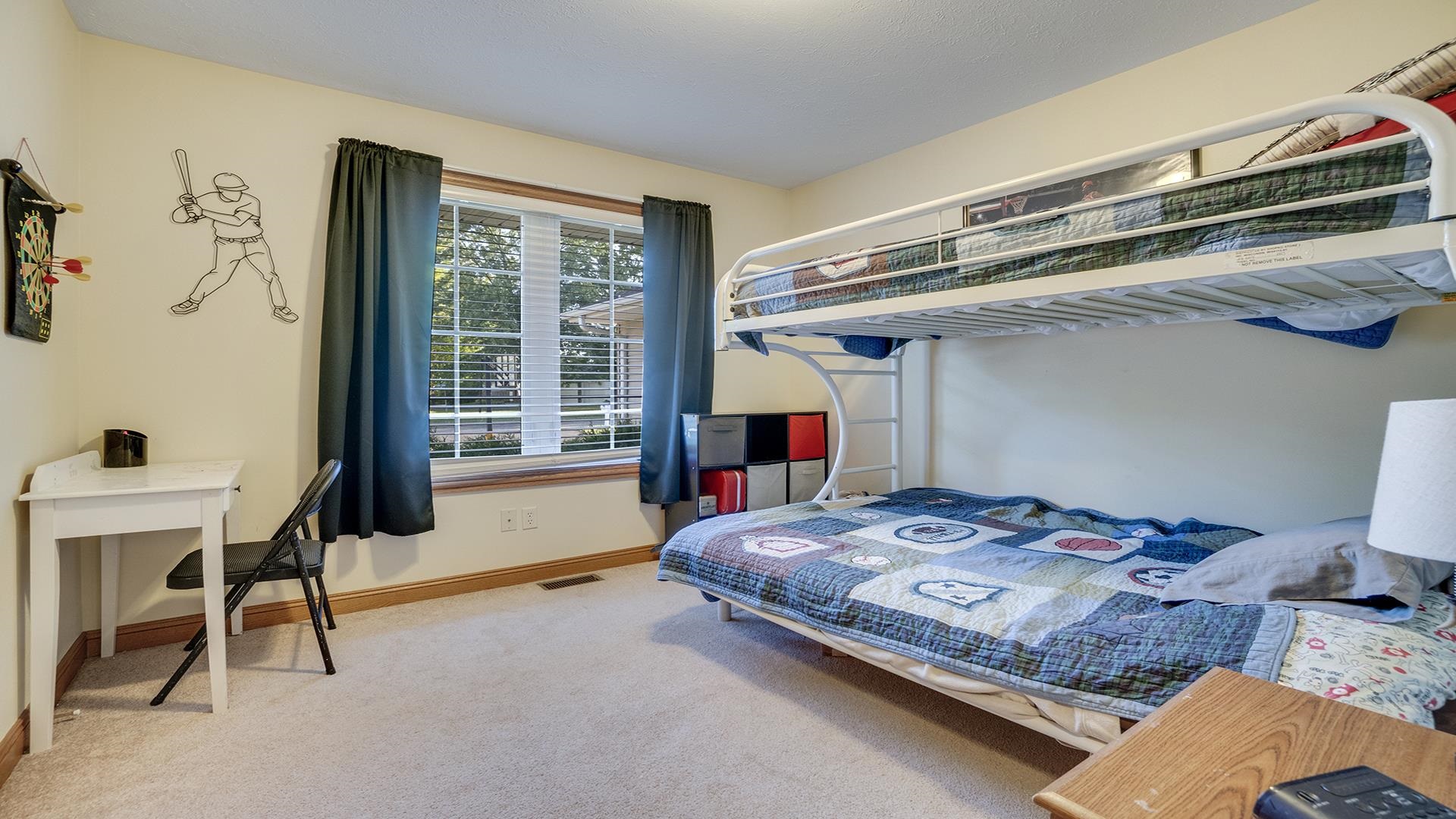 669 Lake Summerset Road Davis, IL 61019 - Photo 11 of 36 a bedroom with a bed and a table in it