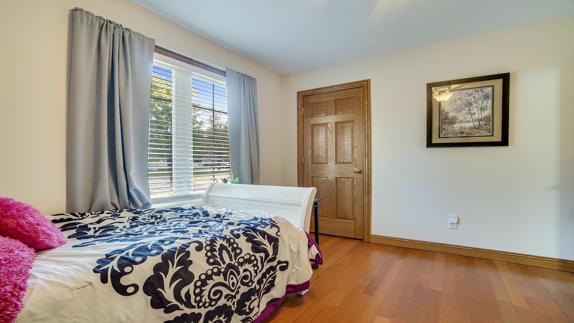 669 Lake Summerset Road Davis, IL 61019 - Photo 14 of 36 a bed sitting in a bedroom next to a window