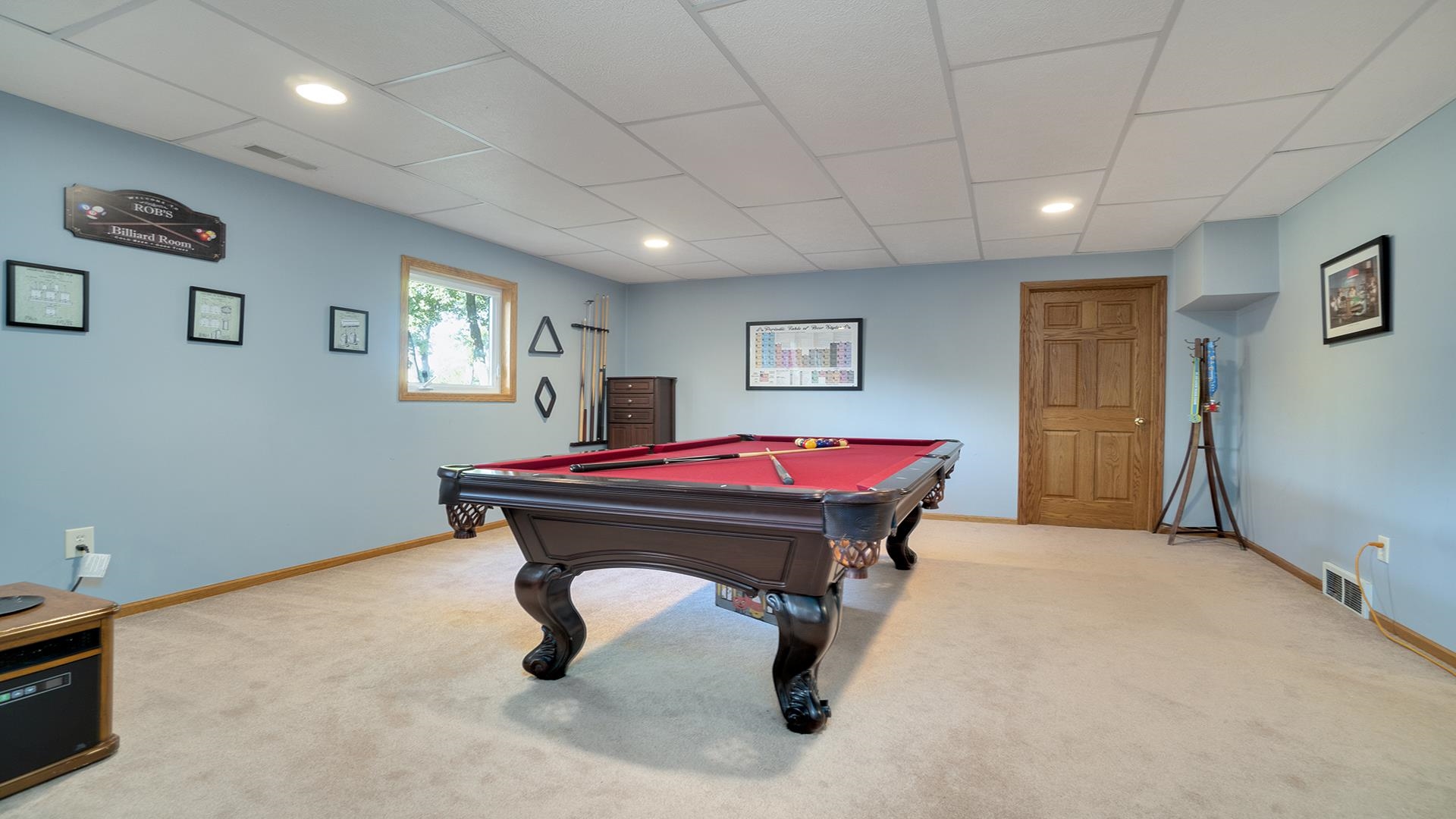 669 Lake Summerset Road Davis, IL 61019 - Photo 21 of 36 a room with pool table and paintings on wall