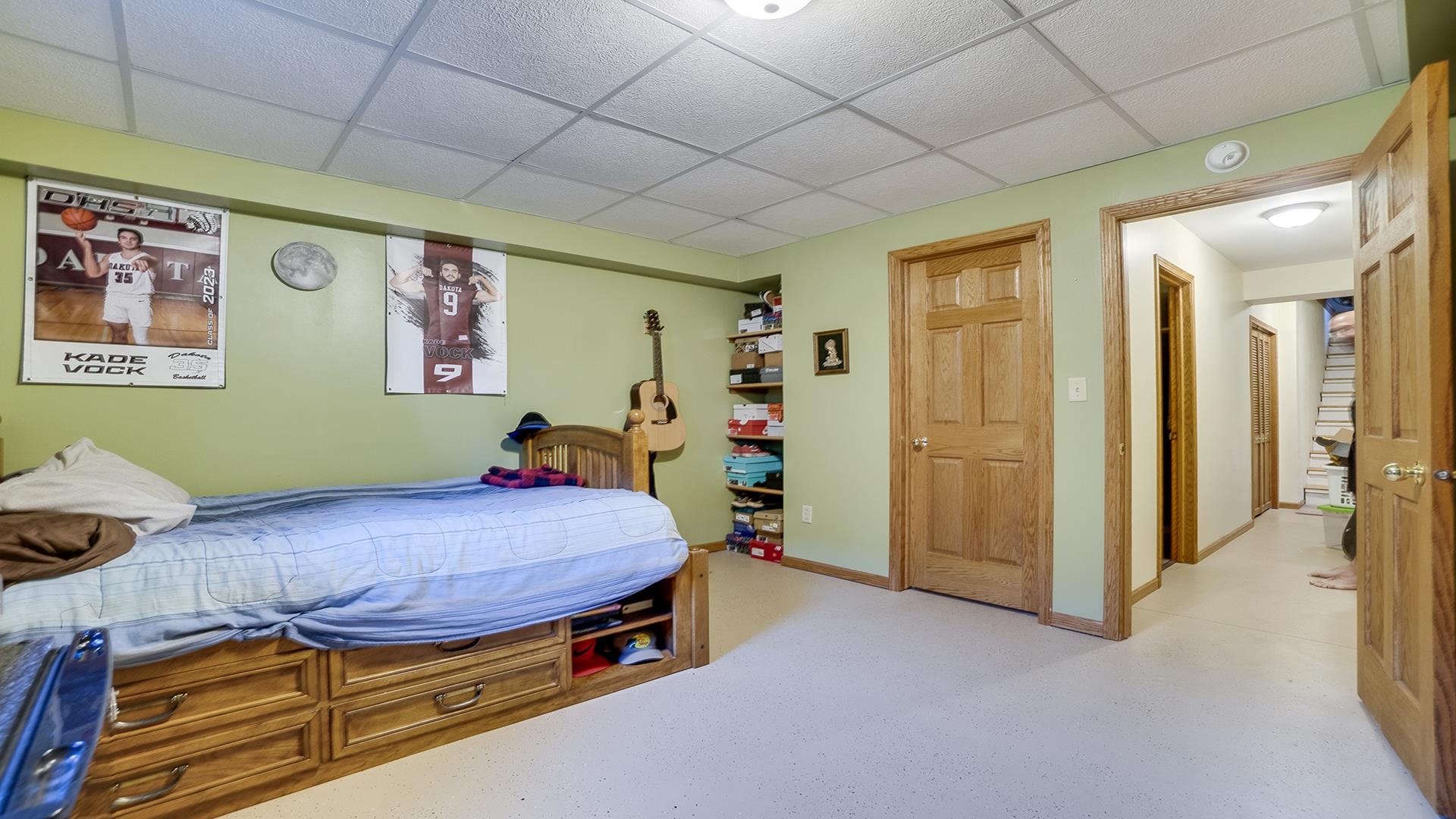 669 Lake Summerset Road Davis, IL 61019 - Photo 26 of 36 a bed room with a bed and paintings on the wall