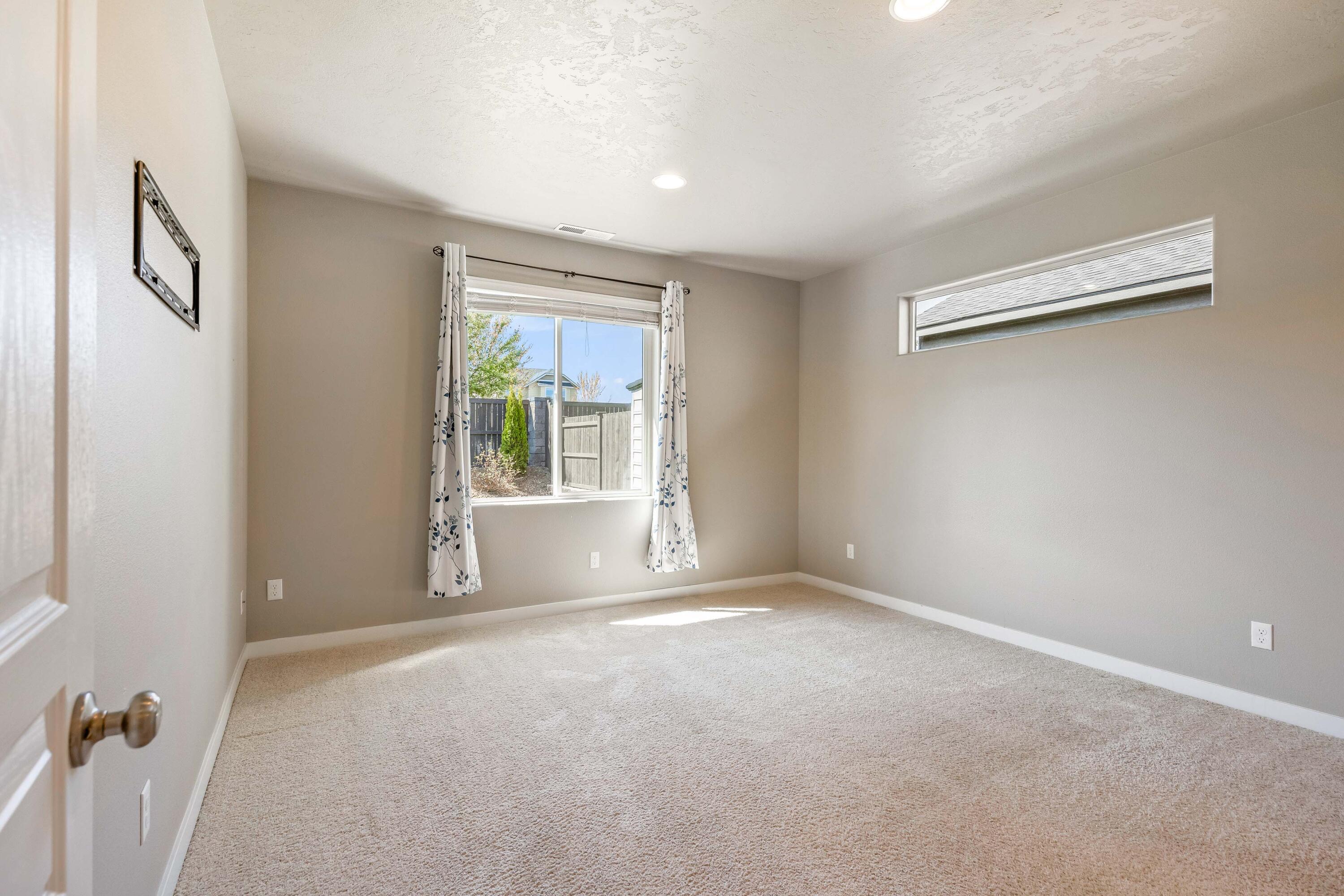 2510 Northwest Hemlock Way Redmond, OR 97756 - Photo 11 of 32 a view of an empty room with a window
