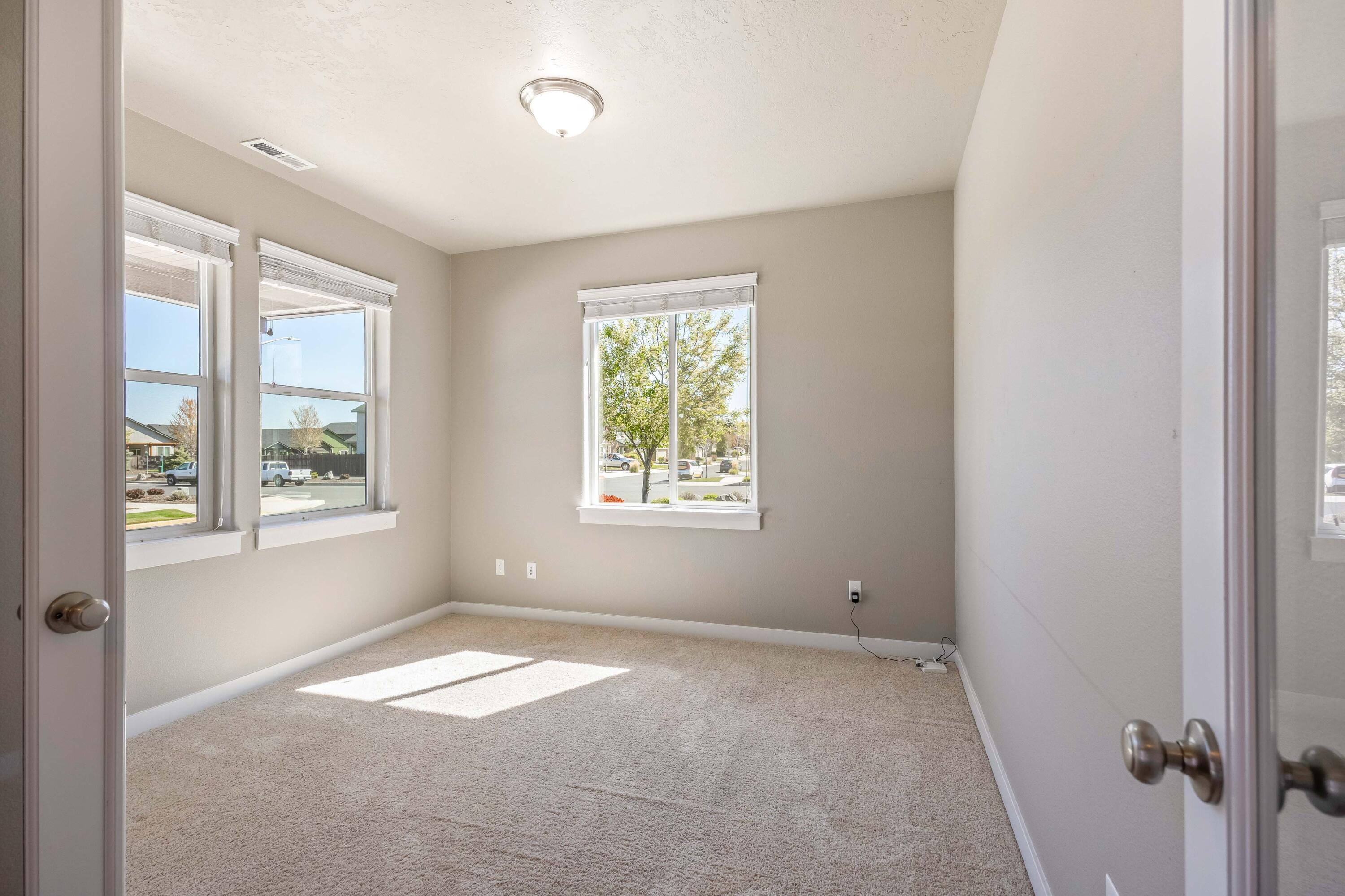 2510 Northwest Hemlock Way Redmond, OR 97756 - Photo 14 of 32 a view of a room with a window and a livingroom