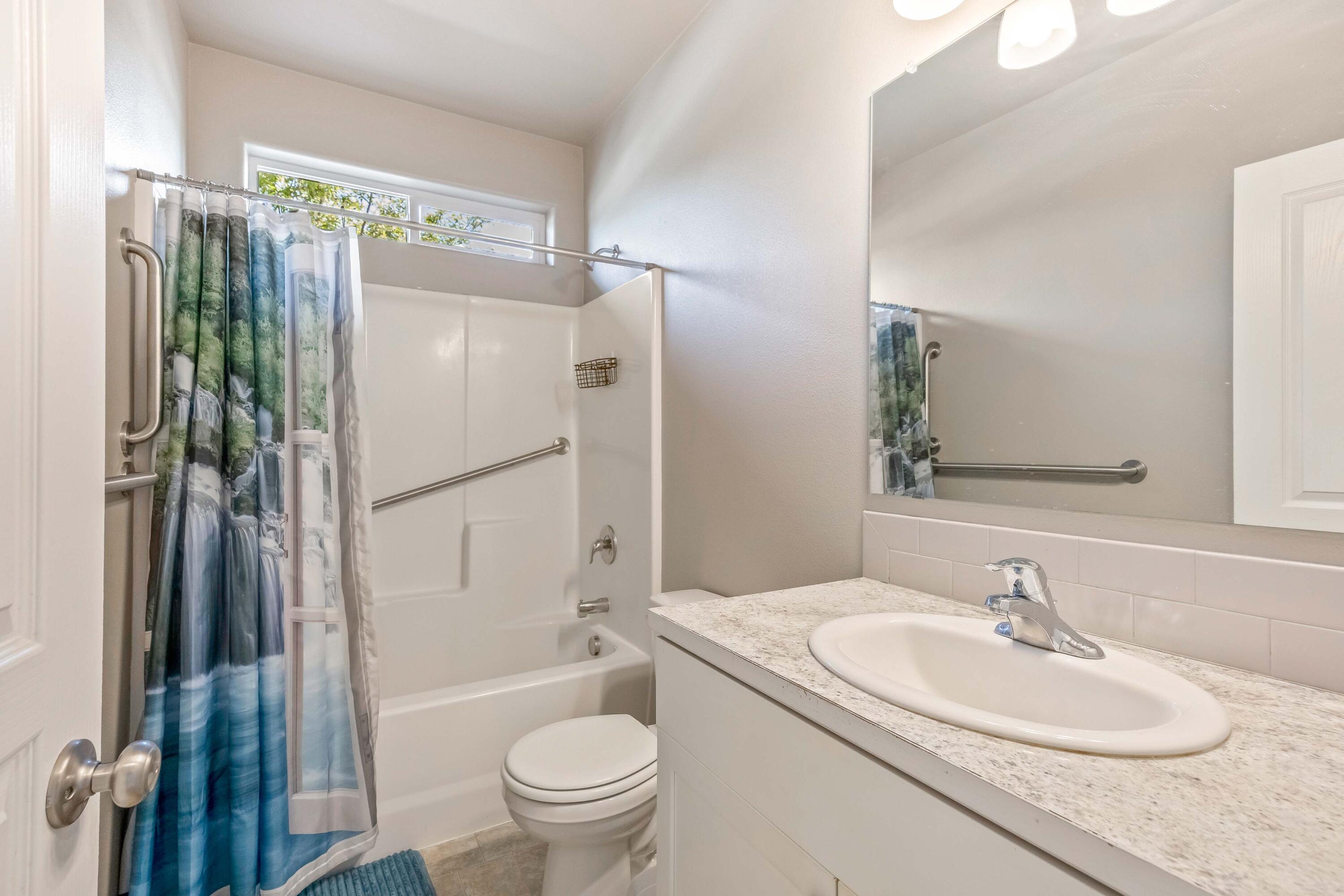 2510 Northwest Hemlock Way Redmond, OR 97756 - Photo 18 of 32 a bathroom with a sink toilet and shower