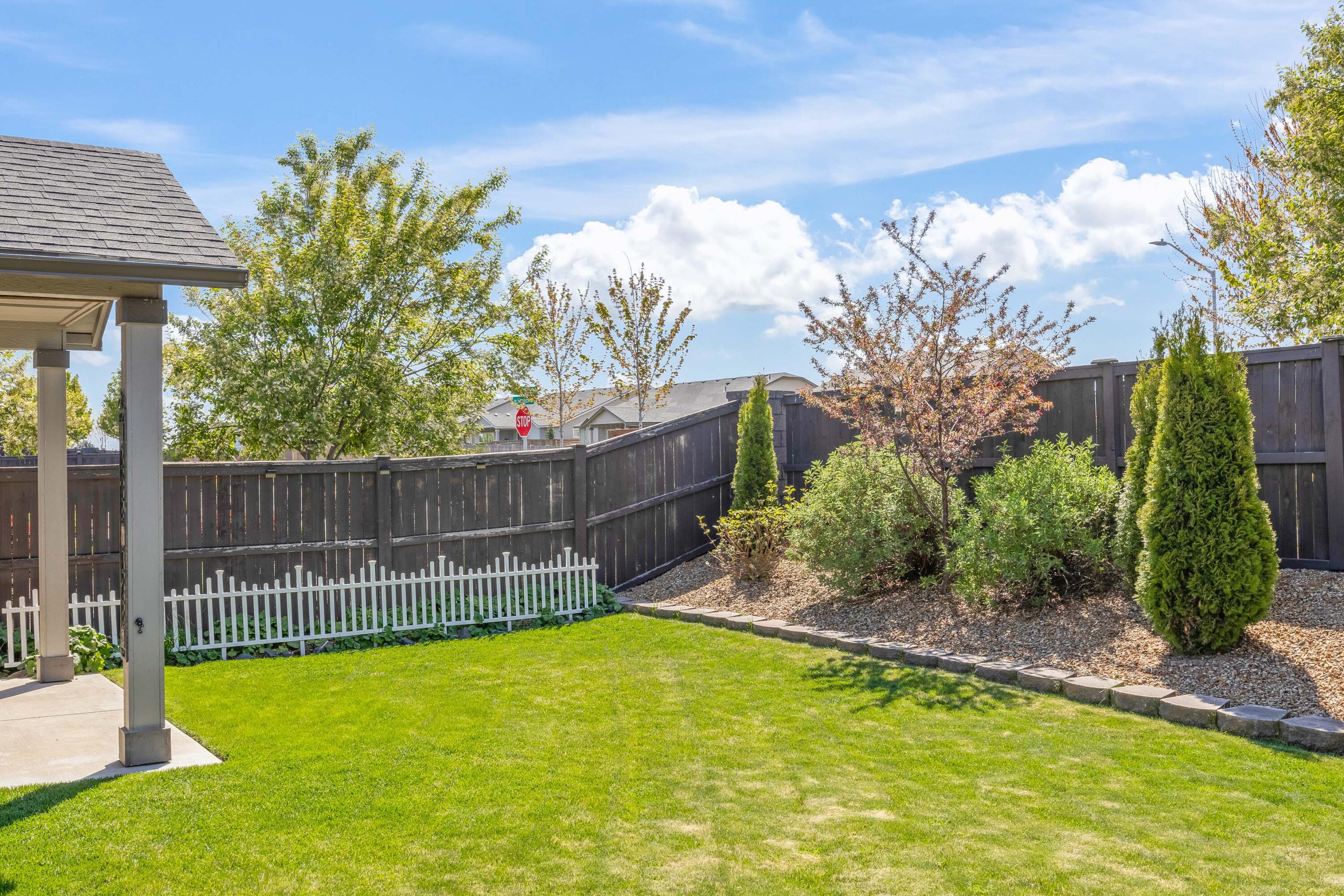 2510 Northwest Hemlock Way Redmond, OR 97756 - Photo 24 of 32 a view of a backyard with plants