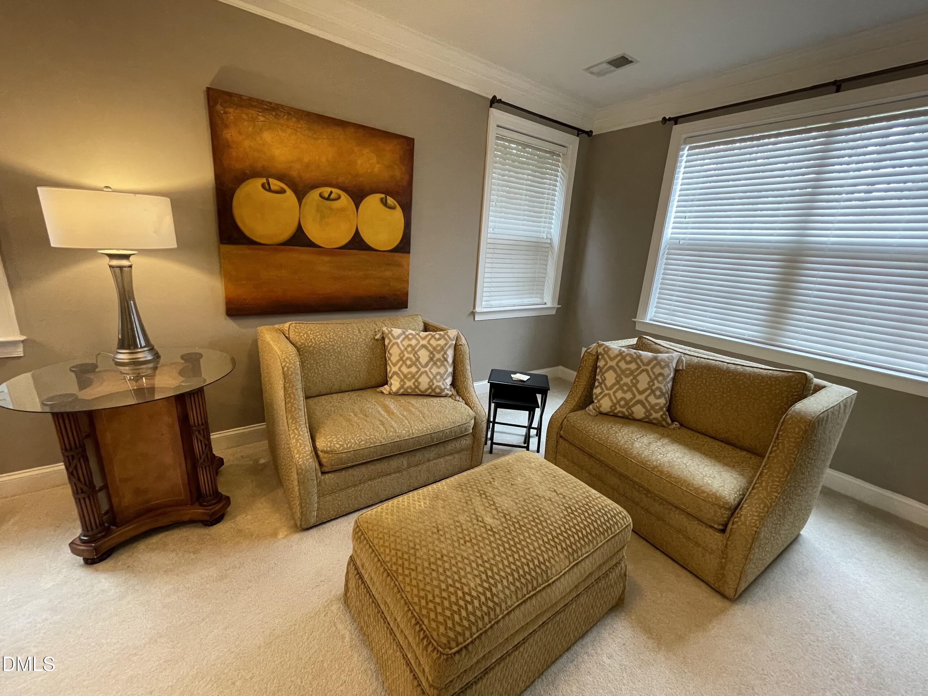 10411 Rosegate Court, Unit 3 Raleigh, NC 27617 - Photo 43 of 62 a living room with furniture and a window
