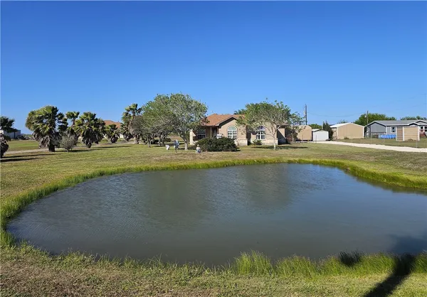 a view of a swimming pool and lake view