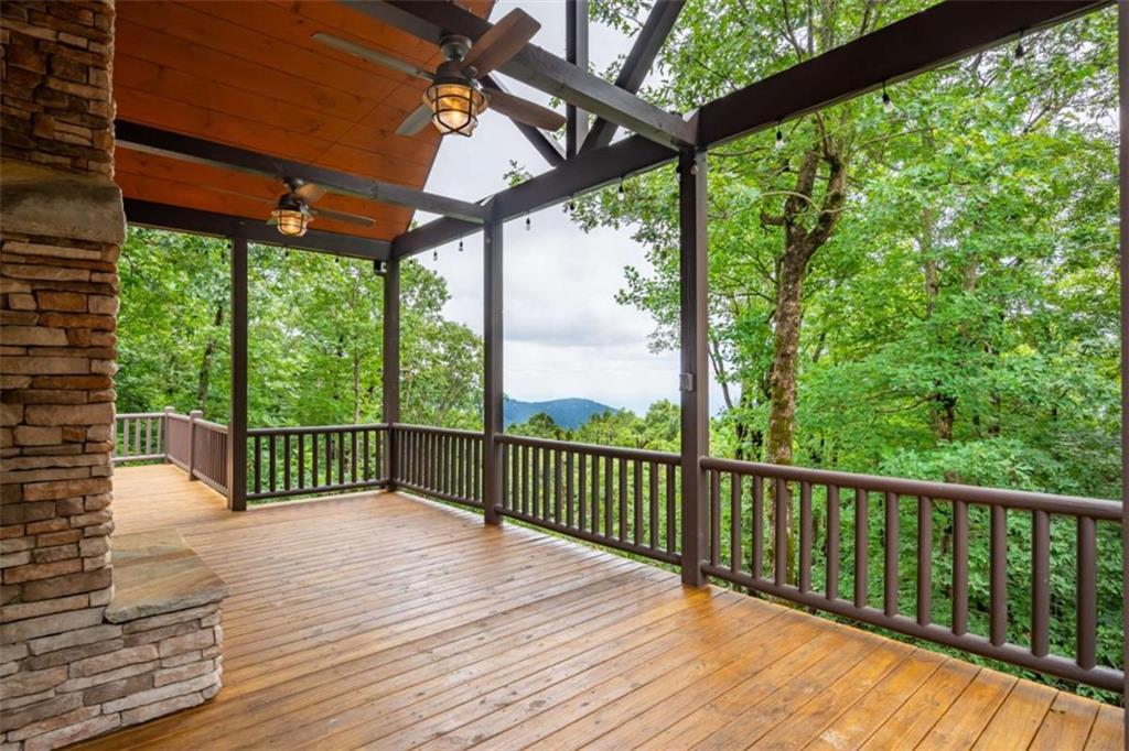 31 High Cliff Road Jasper, GA 30143 - Photo 2 of 50 a view of a wooden deck